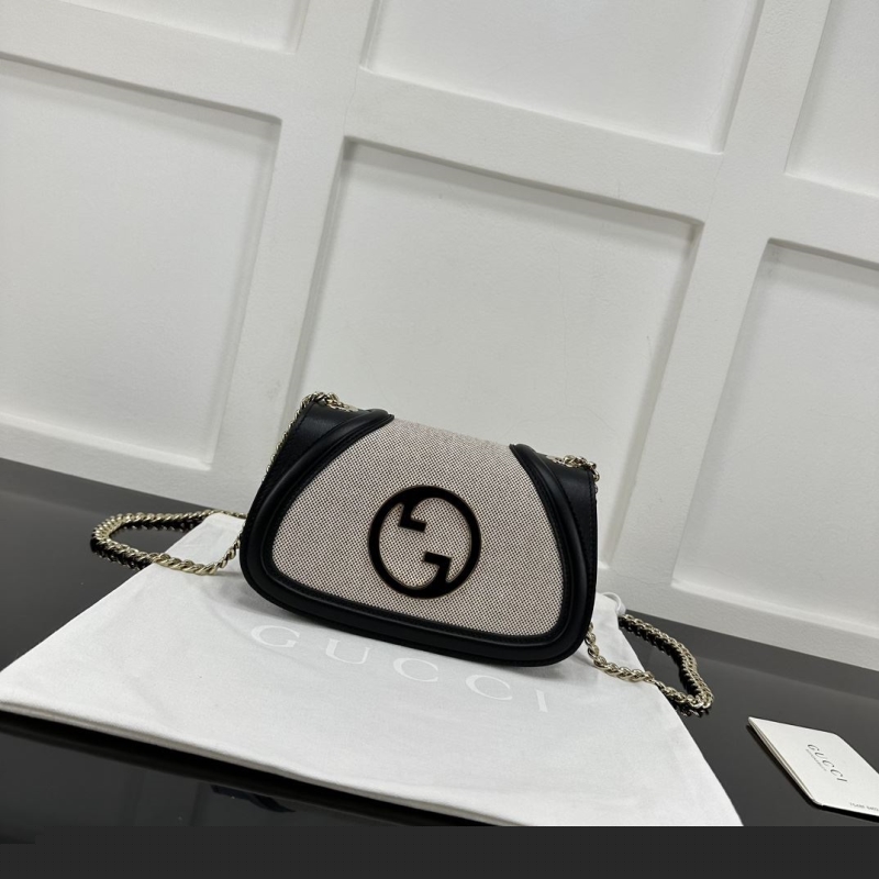 G*u*i satchel bags